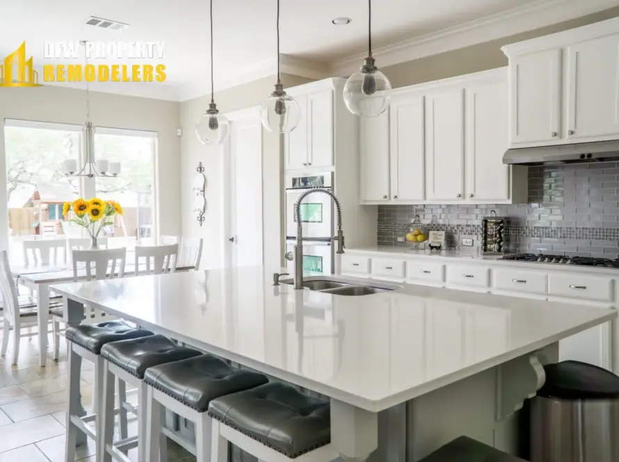 Kitchen Remodel Ideas for modern homes with white cabinets, island, and quartz countertops.