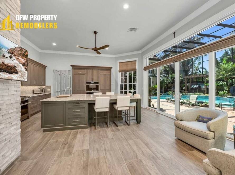 Home Remodeling Trends in Dallas featuring modern open kitchen, large windows, and stylish interior design.