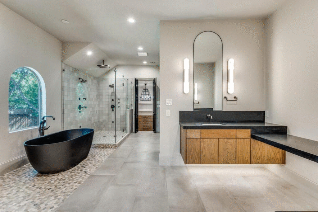 Home Remodeling Trends in Dallas featuring modern open kitchen, large windows, and stylish interior design.