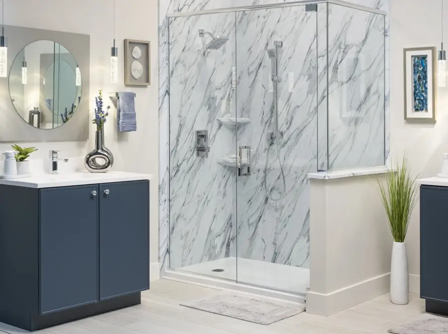 Bathroom remodelers in Dallas showcase marble shower, navy cabinets & modern chrome fixtures